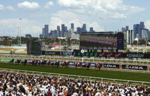 Spectators look on during the running of the 2023 Melbourne Cup on Melbourne Cup Day at Flemington Racecourse in Melbourne, Tuesday, November 7, 2023. (AAP Image/Con Chronis) NO ARCHIVING, EDITORIAL USE ONLY