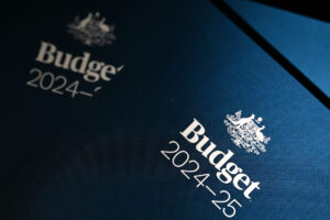 A copy of the 2024/25 Budget paper is seen inside the Budget lockup at Parliament House in Canberra, Tuesday, May 14, 2024. Australian Treasurer Jim Chalmers will today hand down the 2024/25 Federal Budget. (AAP Image/Lukas Coch) NO ARCHIVING